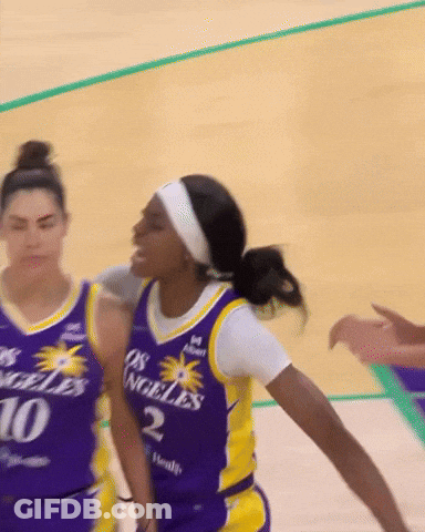 A Female Basketball Player Wearing A Jersey That Says Los Angeles On It GIF
