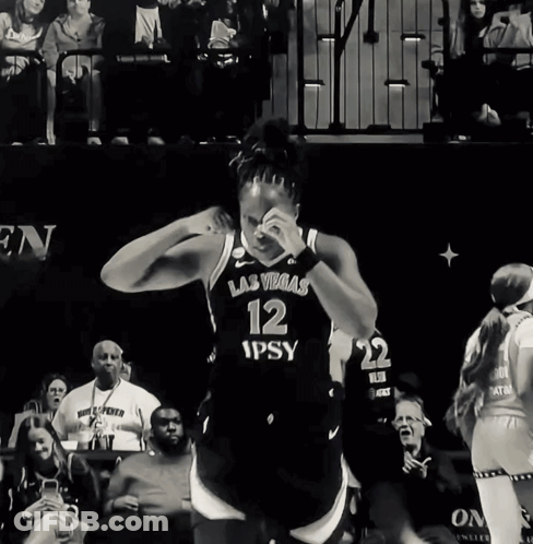 A Female Basketball Player Wearing A Las Vegas Number 12 Jersey GIF