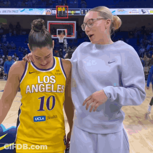 A Female Basketball Player Wearing A Los Angeles Number 10 Jersey GIF