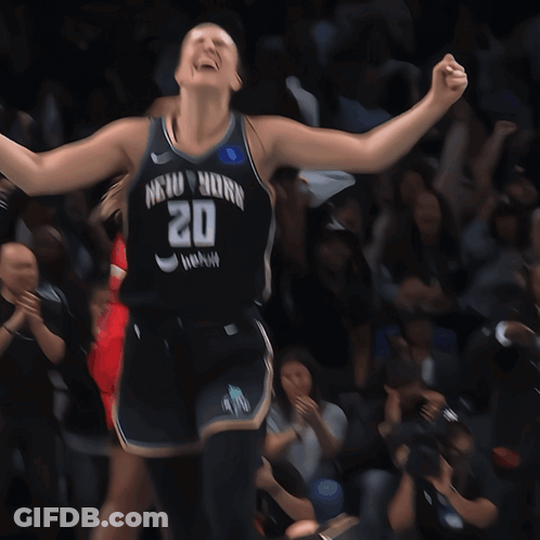A Female Basketball Player Wearing A New York Jersey GIF
