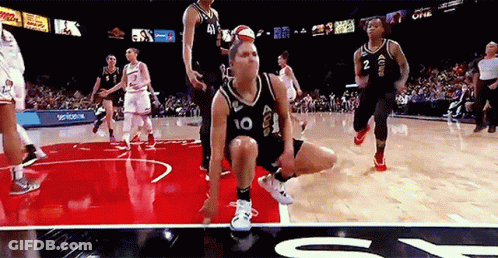 A Female Basketball Player Wearing A Number 10 Jersey GIF