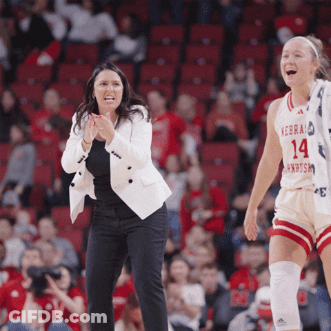 A Female Basketball Player Wearing A Number 14 Jersey GIF
