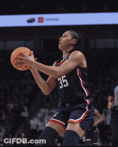 A Female Basketball Player Wearing A Number 35 Jersey GIF