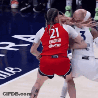 A Female Basketball Player Wearing A Red Jersey With The Number 21 On It GIF