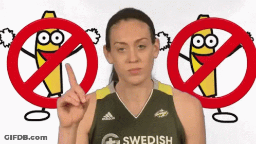 A Female Basketball Player Wearing A Swedish Jersey Is Pointing At Something GIF