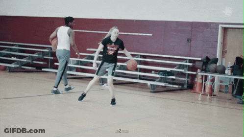 Female Basketball Player Dribbling Ball In Number 9 T-Shirt GIF