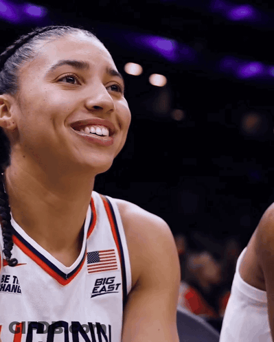 A Female Basketball Player Wears A Jersey That Says Big East GIF