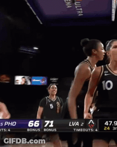A Female Basketball Player With The Number 10 On Her Shirt GIF