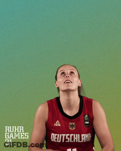 A Female Basketball Player With The Number 11 On Her Jersey Shoots The Ball GIF