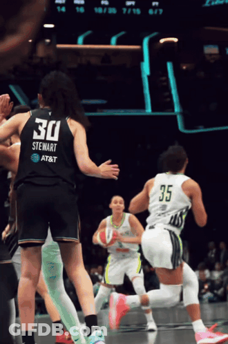 A Female Basketball Player With The Number 30 On Her Jersey GIF