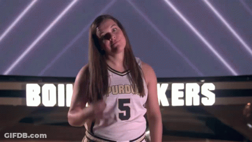 A Female Basketball Player With The Number 5 On Her Shirt GIF