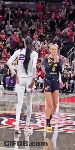 A Female Basketball Player With The Number 8 On Her Shorts GIF