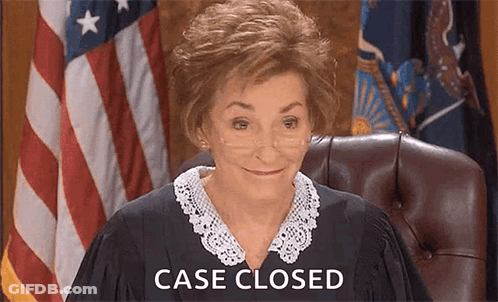 A Female Judge Is Sitting In A Courtroom With The Words `` Case Closed '' Behind Her . GIF