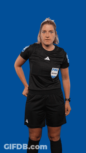 A Female Referee Holds Up A Red Card With The Word Fifa On It GIF