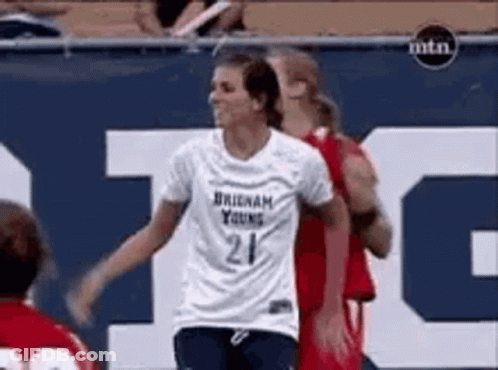 A Female Soccer Player Wearing A Number 21 Jersey GIF