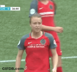 A Female Soccer Player Wearing A Providence Health & Services Jersey GIF