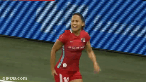A Female Soccer Player Wearing A Red Jersey With The Number 16 On It GIF