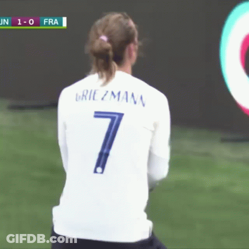 A Female Soccer Player Wearing A White Jersey With The Number 7 On It GIF