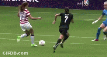 A Female Soccer Player With The Number 7 On Her Jersey Is Running Towards The Ball GIF