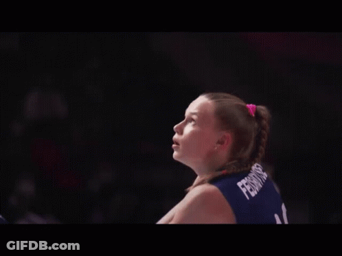A Female Volleyball Player Wearing A Number 11 Jersey GIF