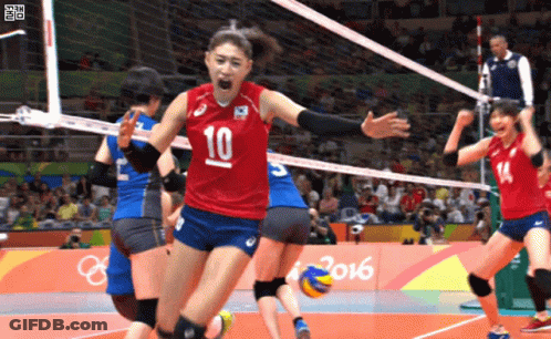 A Female Volleyball Player With The Number 10 On Her Shirt GIF