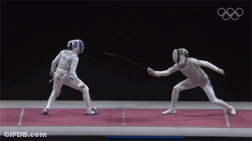 A Fencer Wearing A Helmet With The Word Fra On It Is Fighting Another Fencer GIF