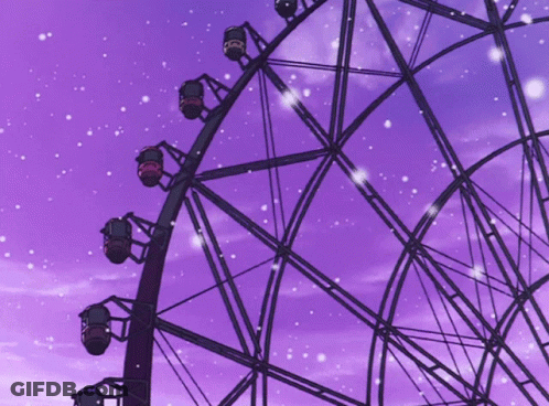 A Ferris Wheel With A Purple Sky Behind It GIF