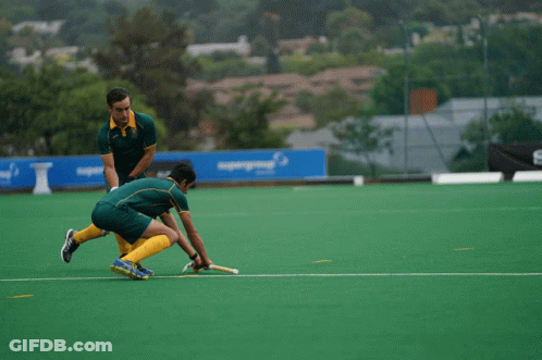A Field Hockey Game Is Being Played In Front Of A Sony Sign GIF