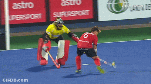 A Field Hockey Game Is Being Played In Front Of An Astro Supersport Sign GIF