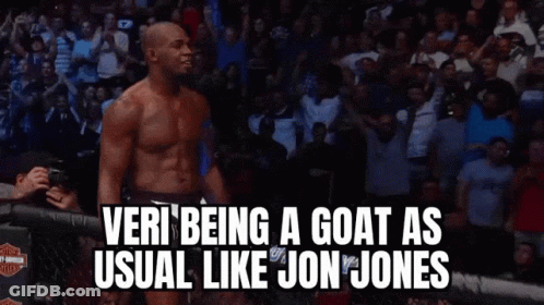 A Fighter In A UFC Ring With The Words " Veri Being A Goat As Usual Like Jon Jones " Below Him GIF