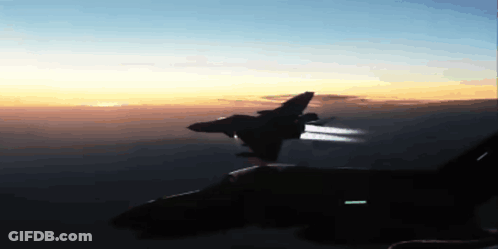 Fighter Jet Flying Over Sunset Sky GIF