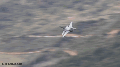 Fighter Jet Flying With Smoke Trail GIF