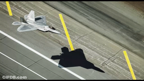 A Fighter Jet Is Taking Off From A Runway GIF
