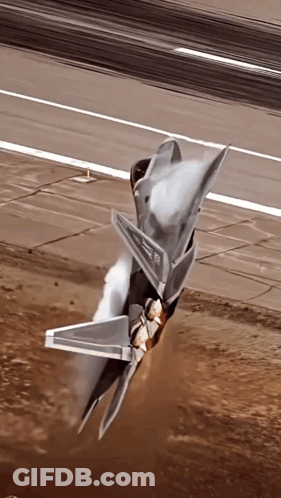 A Fighter Jet Is Taking Off From A Runway With The Letters Ee On Its Tail GIF