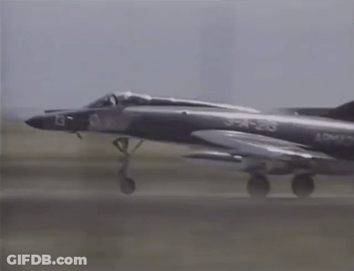 A Fighter Jet With The Number 3-1-23 On The Side GIF