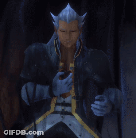 A Figurine Of A Man With Blue Hair And Horns Is Sitting In Front Of A Rock GIF