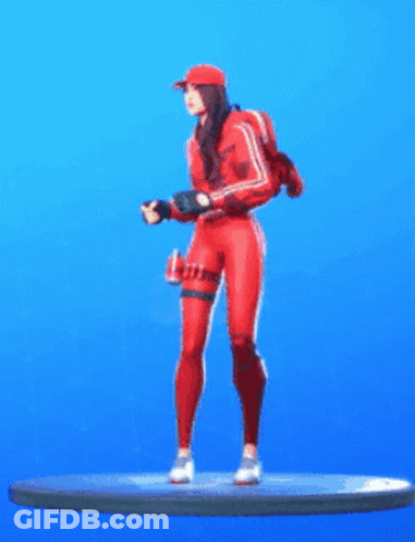 A Figurine Of A Woman In A Red Outfit Is Standing On A Blue Surface . GIF