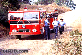 A Fire Truck With The Number 51 On The Front GIF
