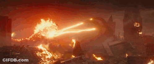A Fireball Is Being Thrown At A Monster In A Movie Scene . GIF