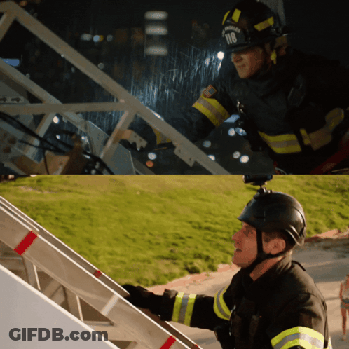 A Firefighter Wearing A Helmet With The Number 108 On It GIF