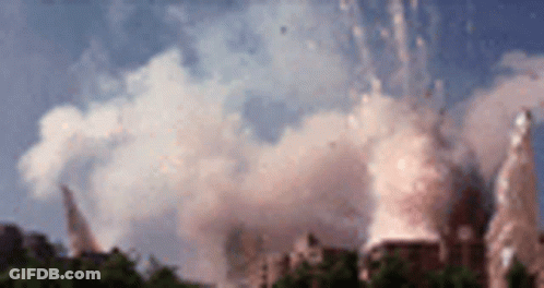 A Fireworks Display Is Going Off In The Sky GIF