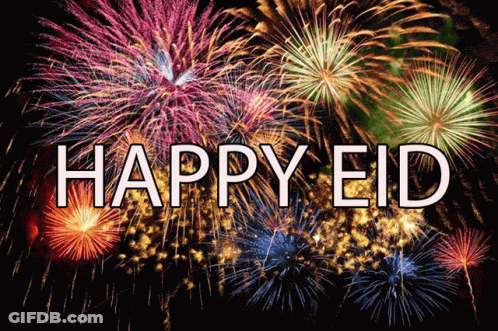 A Fireworks Display With The Words Happy Eid Written In White GIF