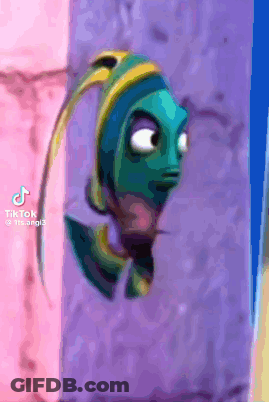 A Fish From The Movie Finding Dory Is Hanging On A Wall . GIF