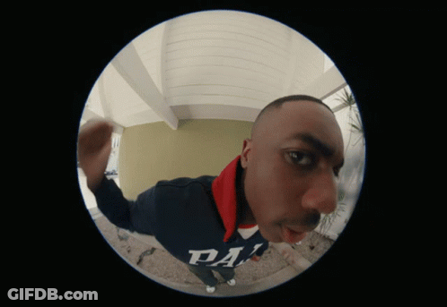 A Fisheye View Of A Man Wearing A Sweatshirt That Says Da GIF