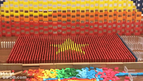 A Flag Made Out Of Dominoes With A Yellow Star GIF