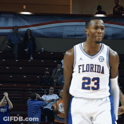 A Florida Basketball Player Wearing Number 23 Stands On The Court GIF