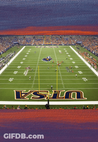 A Football Field With The Word Ucla On The Field GIF