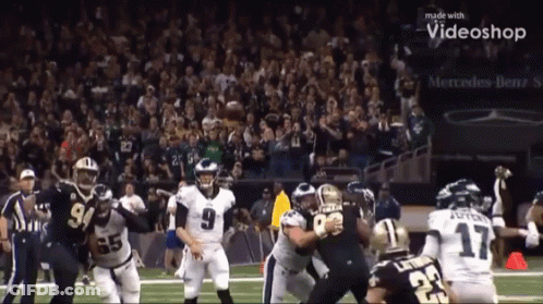 A Football Game Being Played In Front Of A Mercedes Benz Sign GIF