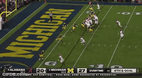 A Football Game Between Alabama And Michigan Is Being Shown On Espn GIF