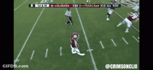 A Football Game Between Alabama And Texas A&m Is Being Played GIF